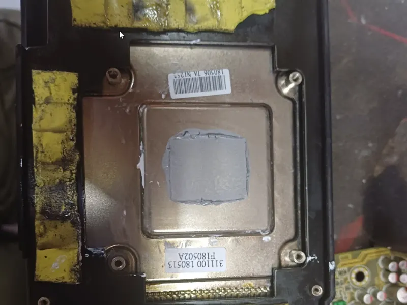 Cleaned CPU socket with fresh thermal paste